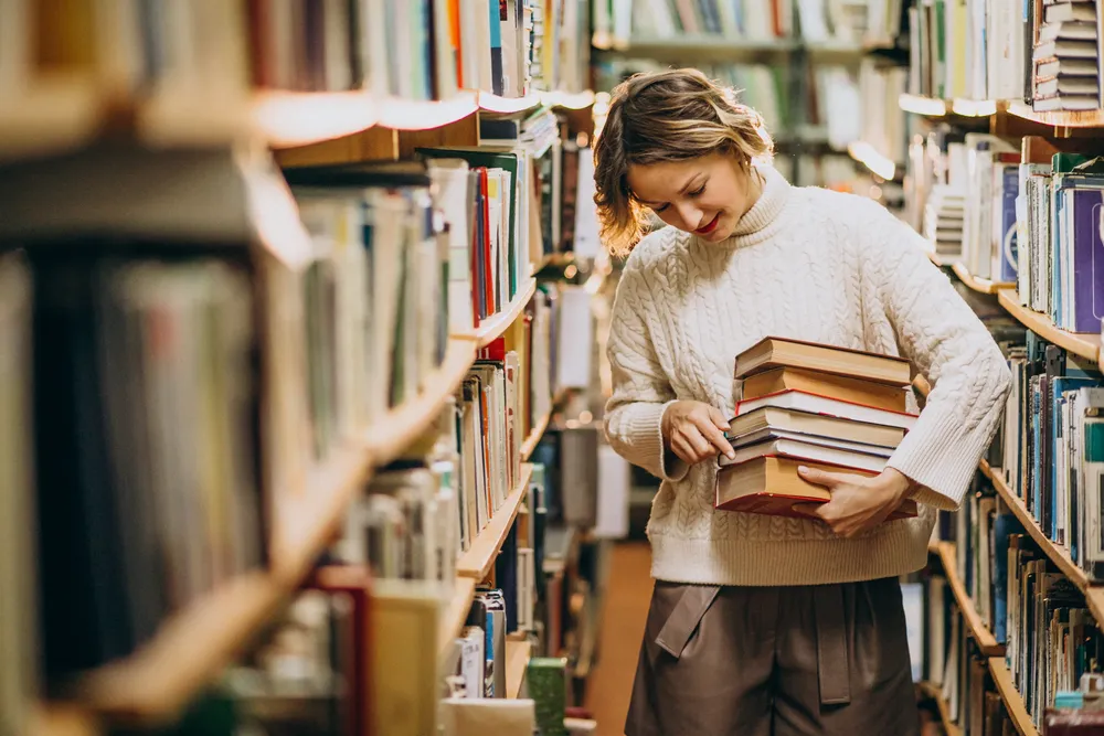 young-woman-studying-library