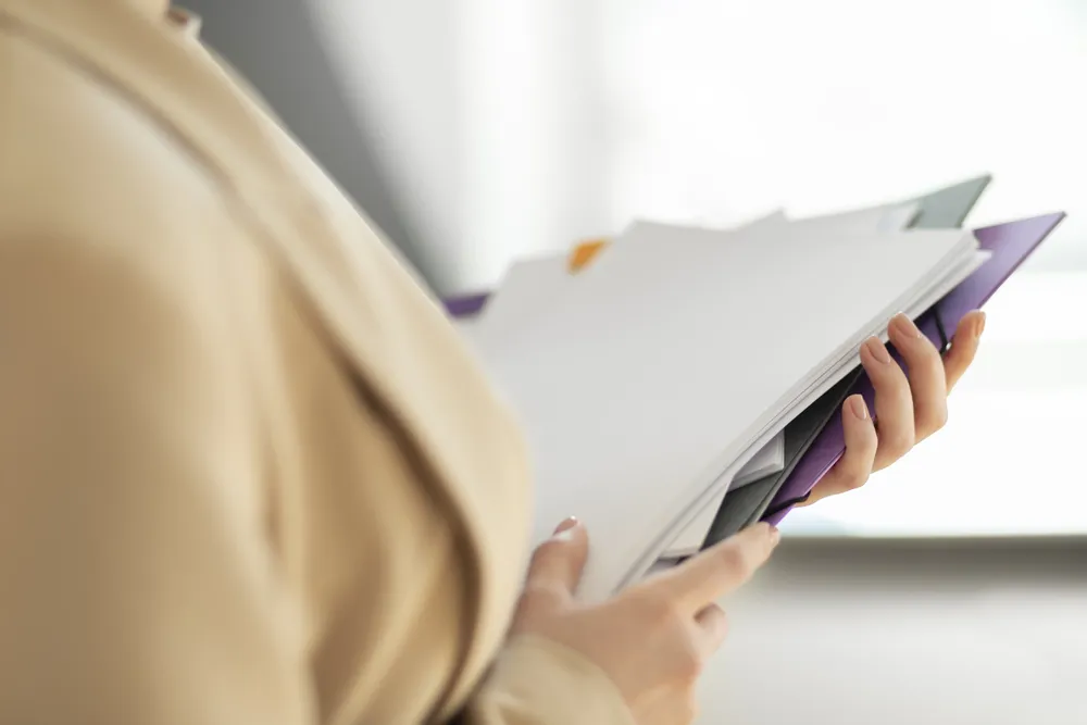 young-adult-organizing-documents